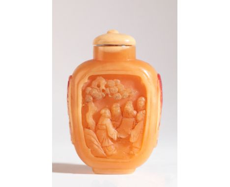 A CHINESE HORNBILL SNUFF BOTTLE 20th century, both sides carved in high relief with scholars under trees, mask and ring handl