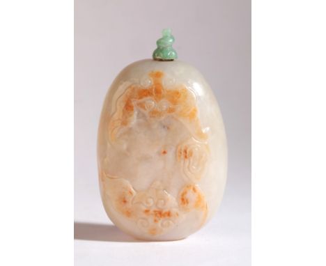 A CHINESE JADE SNUFF BOTTLE late 18th/19th century, of pebble form, carved with bats flying amongst lingzhi fungus, 8cm high 