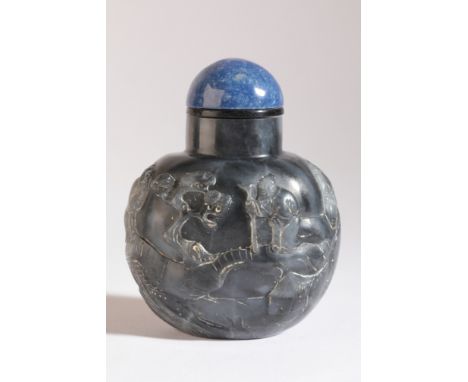 A CHINESE JADE SNUFF BOTTLE 19th century, the 'black' nephrite carved in Suzhou style with three sages in a landscape with br