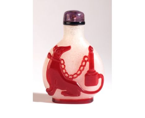 A CHINESE OVERLAY GLASS SNUFF BOTTLE 18th/19th century, the pear shaped body of frosted glass with red overlay depicting a ha