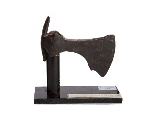 IRON BEARDED BATTLE AXE HEAD,possibly 10th century Viking, 25cm wide, on stand