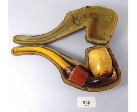 A 19th century large meerschaum pipe in the form of a lady's hand, cased