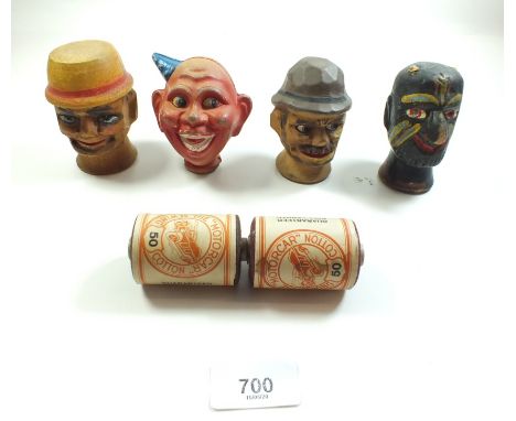 Three Austrian painted wooden novelty heads and a painted composition puppet head