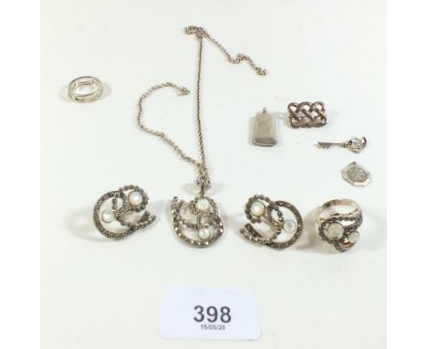 A small group of silver jewellery including moonstone and marcasite