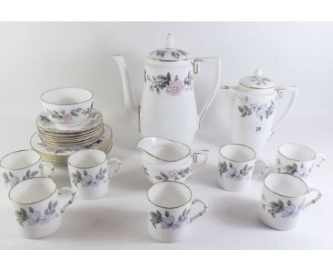 A Royal Worcester 'June Garland' coffee set comprising: seven cups and saucers, five tea plates, milk, sugar, coffee and hot 