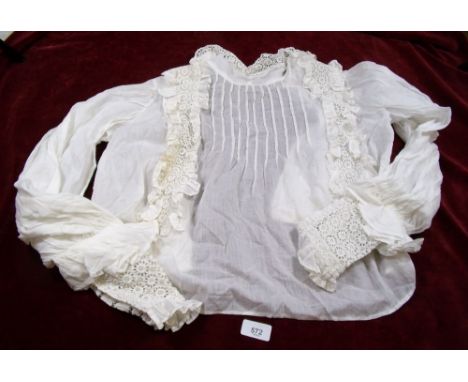 An Edwardian muslin blouse with pintucks and lace