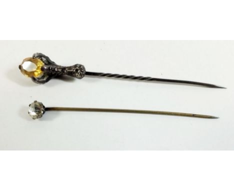 A claw form stick pin set citrine - boxed, and one other stick pin