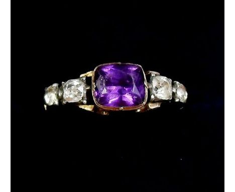 An antique paste ring set amethyst, unmarked but tests as gold, circa 1850, size O