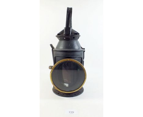 An old railway lamp with green and red lenses