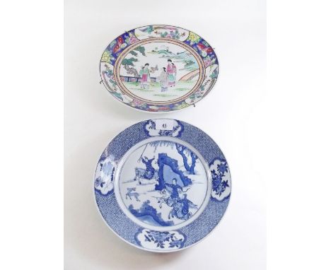 A Chinese Canton plate painted figures and a Chinese blue and white plate painted hunting scene with six character mark to ba
