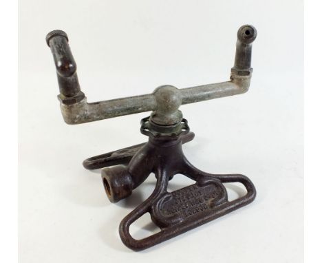 An Edwardian garden hose sprinkler 'Rain Ring' by Cooper Steward London