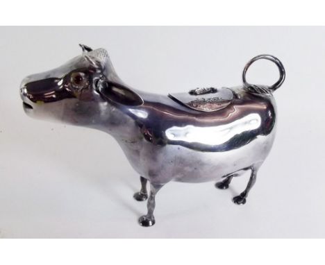 A silver continental cow creamer with glass eyes, continental marks to belly and import marks to tail for Samuel Boyce Landec