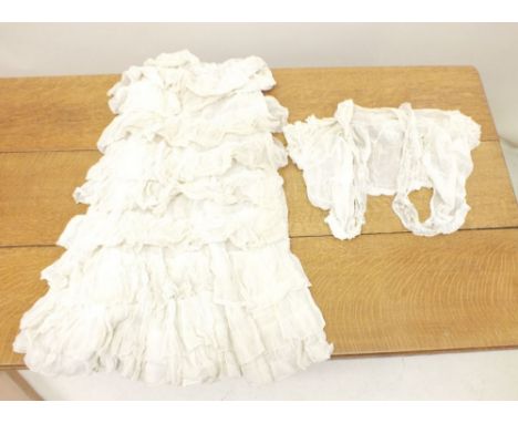A Victorian cream muslin tiered frilled skirt and a muslin blouse
