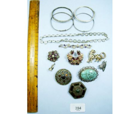 Four silver bracelets and various costume brooches etc including leopard brooch by A + S