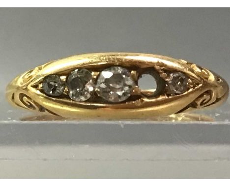 DIAMOND SET EIGHTEEN CARAT GOLD RING AND AN EIGHTEEN CARAT GOLD WEDDING RING the diamond ring missing one stone (2)Qty: 6.5g