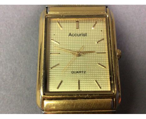 GENT'S ACCURIST WRIST WATCH ALONG WITH AN ETERNITY RING AND TWO COINS the quartz watch in rolled gold, the eternity ring set 