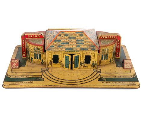 MARX TOYS, TIN PLATE GRAND CENTRAL STATION CIRCA 1935 with lithographed detail, the lift-off roof enclosing wiring and socket