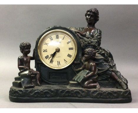 JULIANA MANTEL CLOCK AND OTHER CLOCKS the Juliana mantel clock modelled with a mother and two children, along with four other
