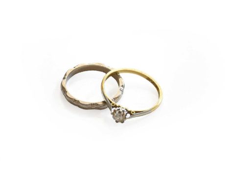 A diamond solitaire ring, stamped '18CT&amp;PLAT', finger size L; and a band ring, stamped '18CT', finger size KFinger size 4