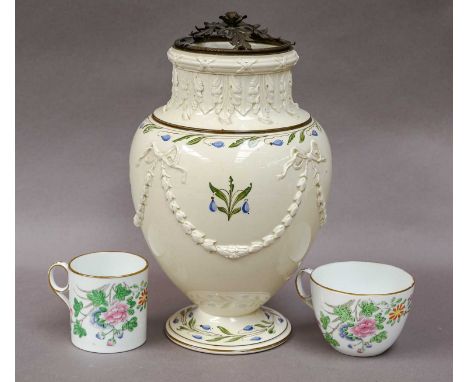 A Wedgewood creamware baluster vase, 18th Century, moulded with ribbon tied husk swags and enameled with flowers together wit