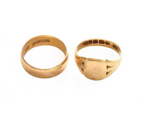 An 18 carat gold band ring, finger size N; and an 18 carat gold signet ring, finger size MGross weight 10.2 grams.