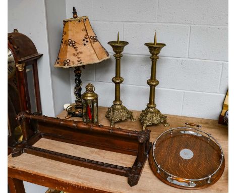 A 20th-century galleried twin-handled tray, an oak hanging wall rack, a pair of brass candle stands, a brass lantern and a ta