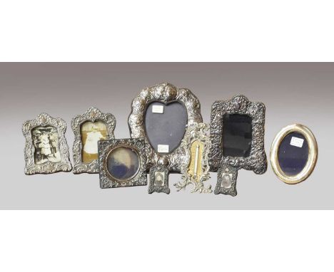 Nine various Victorian and later silver photograph frames, one housing a thermometerHeavy wear from polishing throughout, wor