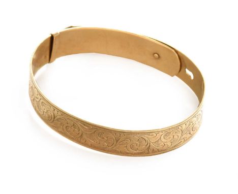 An Edwardian buckle motif bangle, stamped '9CT'Gross weight 20.8 grams.