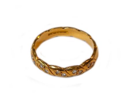 An 18 carat gold diamond half hoop ring, finger size NGross weight 3.1 grams.