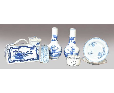 A pair of Chinese blue and white bottle vases, Kangxi marks but 19th century, painted with figures in a garden landscape, tog