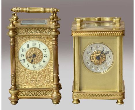 A brass carriage timepiece, circa 1900, Arabic numeral dial chapter ring surrounded by cast floral and scroll decoration, wit