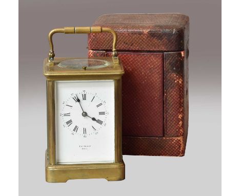 A brass striking and repeating carriage clock, retailed T Kirk &amp; Co, Hull, with a fitted outer traveling caseBrass case i