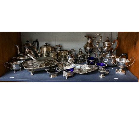 A collection of silver plated items including teasets, cake basket, salt sellers, etc (one shelf)