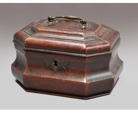 An 18th-century mahogany tea caddy, moulded octagonal cover fitted with a handle on a waisted conforming body, 18cm by 14cm b
