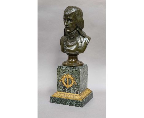 A French patinated portrait bust of young Napoleon, late 19th / early 20th century, raised on a variegated marble plinth with