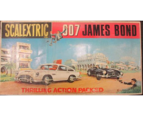 Scalextric 007 James Bond box with two cars (visually good), without the card insert so contents loose, with figures and acce