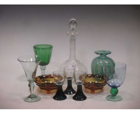 A mixed collection of drinking and other glassware, including two water jugs, a decanter, etc