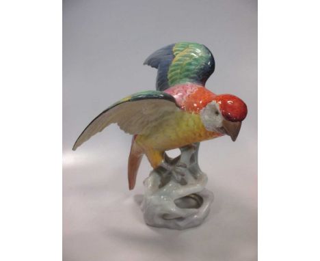 A Copeland Spode porcelain model of a parrot with glass eyes, 29.5cm high