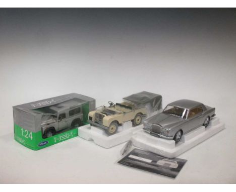 Three boxed model cars to include: Minichamps, Ltd Edition Land Rover, scale 1:18, Welly Land Rover Defender, scale 1:24 and 