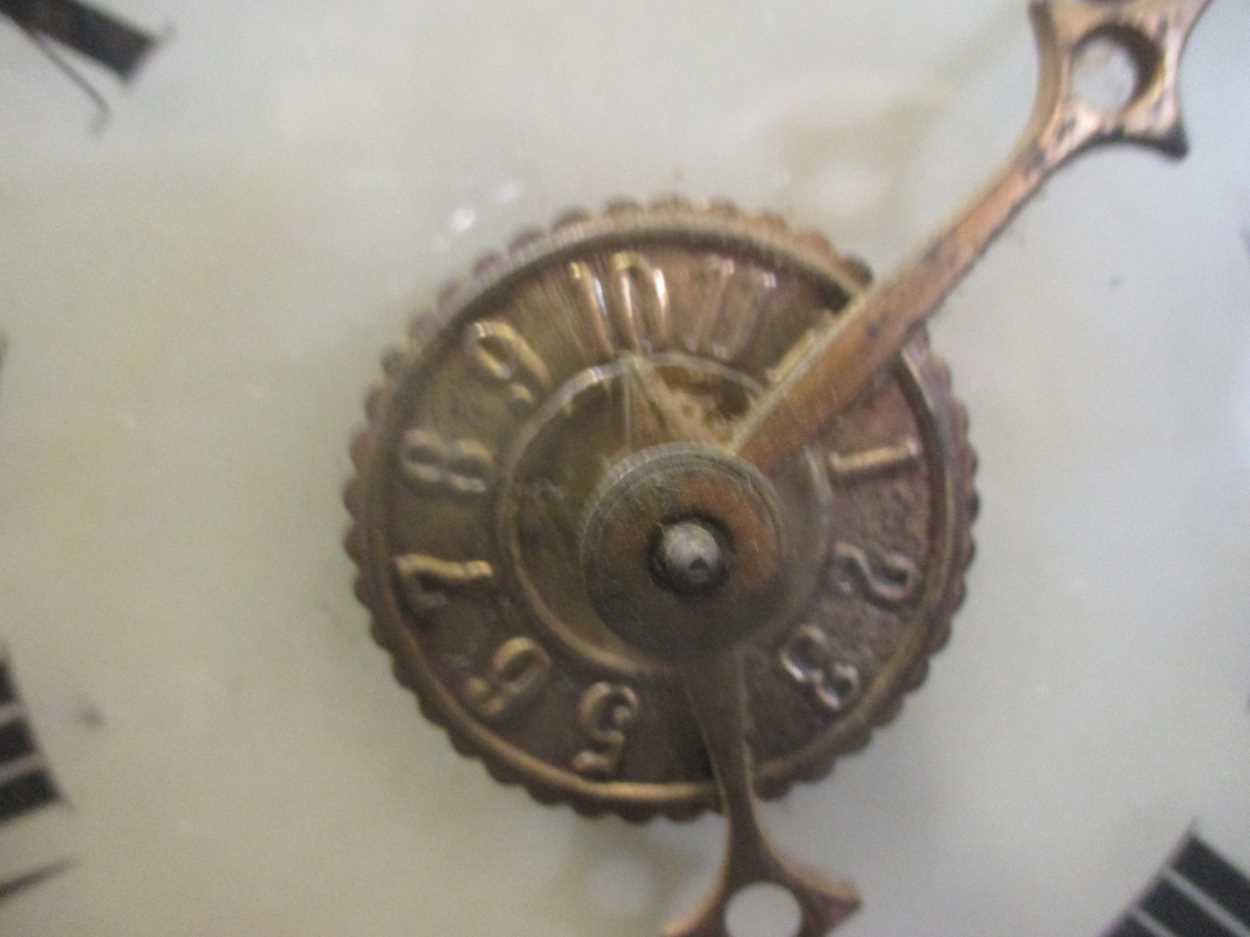 A postman's alarm wall clock, a Vienna type drop dial wall clock and a