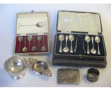 2 cased sets of six silver teaspoons and tongs, together with a further cased set of six teaspoons, a silver bowl, tea strain