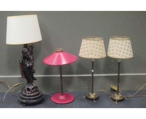 A Chinese carved wood figure adapted into a lamp base together with a French lamp and a pair of brass desk lamps (4)