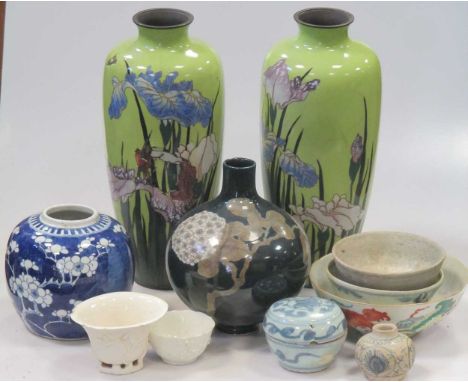 A collection of Asian ceramics, including blanc de Chine cup and a bowl, provincial blue and white wares, a pair of Cloisonné