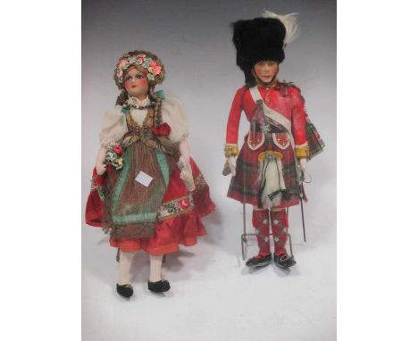 A painted felt head doll of HM The King, Highland uniform, by J.K. Farnell, original white box; together with a similar costu
