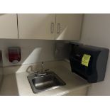 PAPER TOWEL DISPENSER