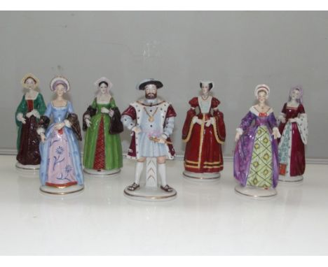 Sitzendorf porcelain figures depicting Henry VIII and his six wives. Factory marks to the base. All approx 20cm high