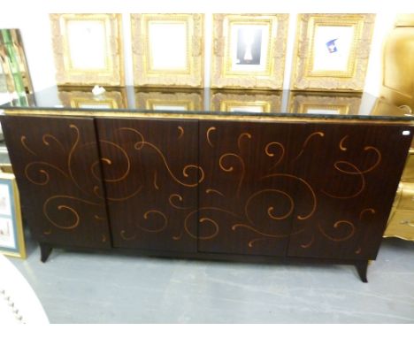 *A CHRISTOPHER GUY COSTLY BLACK LACQUERED AND GILT SCROLL DECORATED LARGE SIDEBOARD WITH POLISHED BLACK GRANITE TOP, FOUR DOO