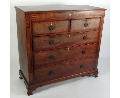 EARLY TWENTIETH CENTURY INLAID MAHOGANY CHEST OF DRAWERS, the moulded oblong top above three oval shell inlays to the frieze,