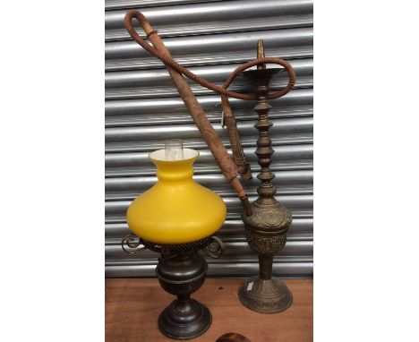 A brass oil lamp with yellow shade and an Asian hubba bubba pipe (2)