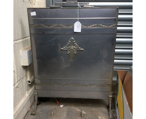 An Art Deco metal fire screen 